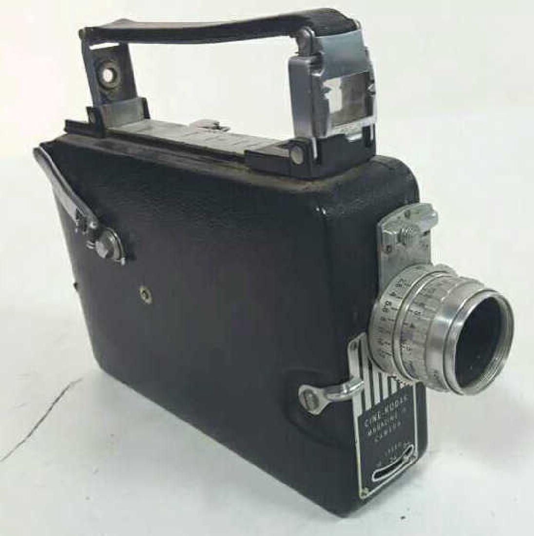 Cine-Kodak Magazine 16 Camera: From a multi-decade collector of cameras and accessories. This lot consists of a Cine-Kodak Magazine 16 Camera. Can film in 16, 24, 64 frames per second. Has a Kodak cine ektar lens 25mm f/1.9. Made i