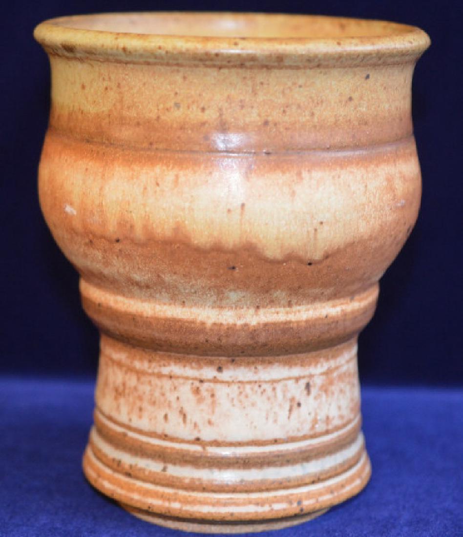 Earth Tone Clay Vase: Nice piece in warm earthy colors- goes with any décor. 6 1/2" x 5"