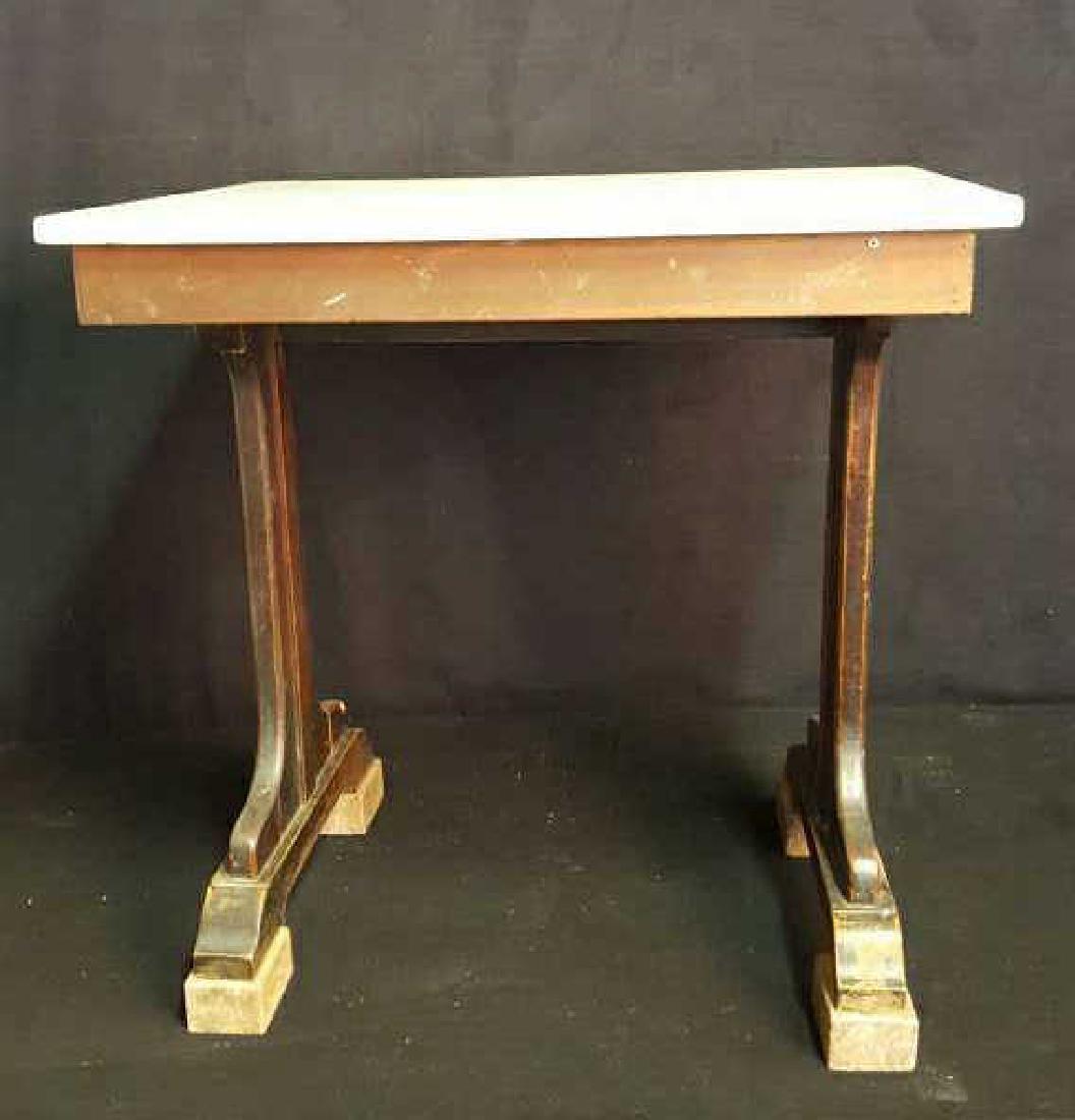 Marble and Wood Side Table Marble and Wood Side Table,: Marble and Wood Side Table, end table, appear to be marble top, dark wood legs, legs sit on granite boxes, some scratches and chips to top and legs, measures 30 inches high by 30 inches wide by 24 inc