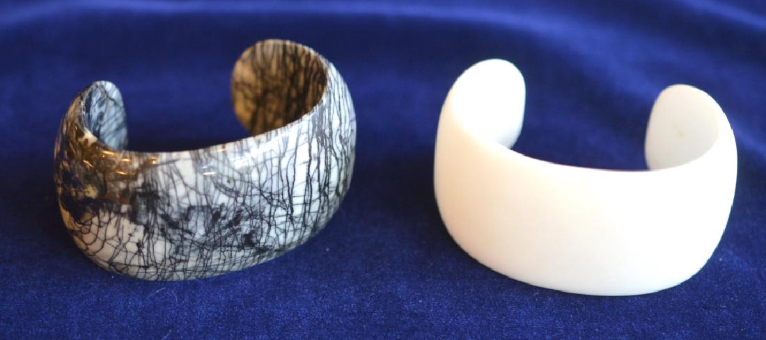 Vintage Set Of Soapstone Cuff Bracelets: One white & one black, 1 5 wide 6.6 round