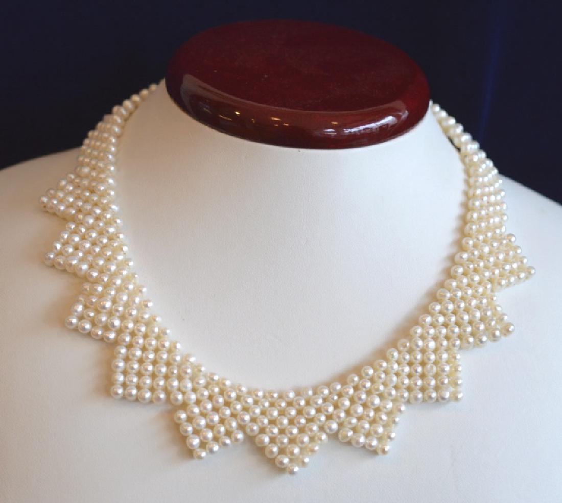 15" Pearl Choker With 14K Gold Clasp: 15" Flat weave of3.5mm x 4mm Pearls with a cute "V" design edge