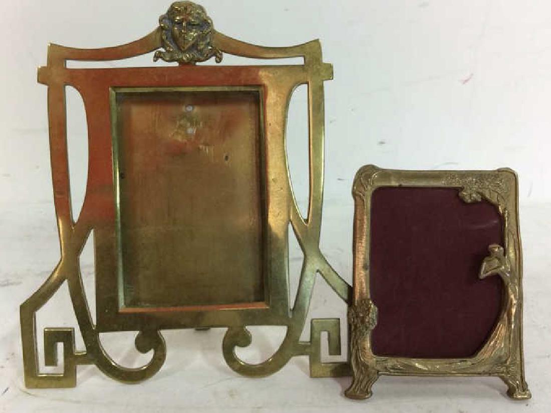 2 Antique Art Nouveau Brass Frames Two antique Frames: Two antique Frames art Nouveau, Art Deco, arts and crafts. First stylized geometric and swirled frame around inner rectangle with crown of female head measures ht 6.5 inches width 6 inches. Second has