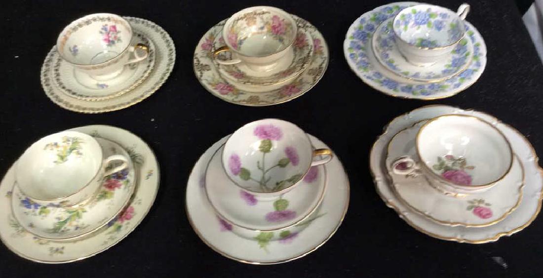 6 Floral Porcelain Dessert Services: Floral patterned Porcelain cake plates dessert plates with matching cups and saucers. Vintage Collectibles table accessories, cake plate measures app 8 inch diameter. Patterns include Germany, Hutsche