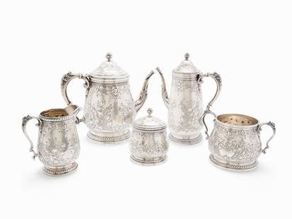 5 pc Sterling Coffee Service: Sterling silver and bone United States, first half of the 20th C. Hallmarks: ‘STERLING’, ‘Hand Chased’, ‘21’, with a crown and crest mark featuring a cornucopia, a strong arm, and the lett