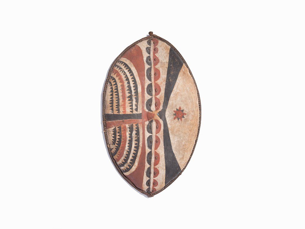 Maasai Shield: Water buffalo hide, wood, natural and commercial pigments Tanzania or Kenya, middle of the 20th C. Maasai People – the semi-nomadic people of the African Great Lakes region Characteristic oval form 