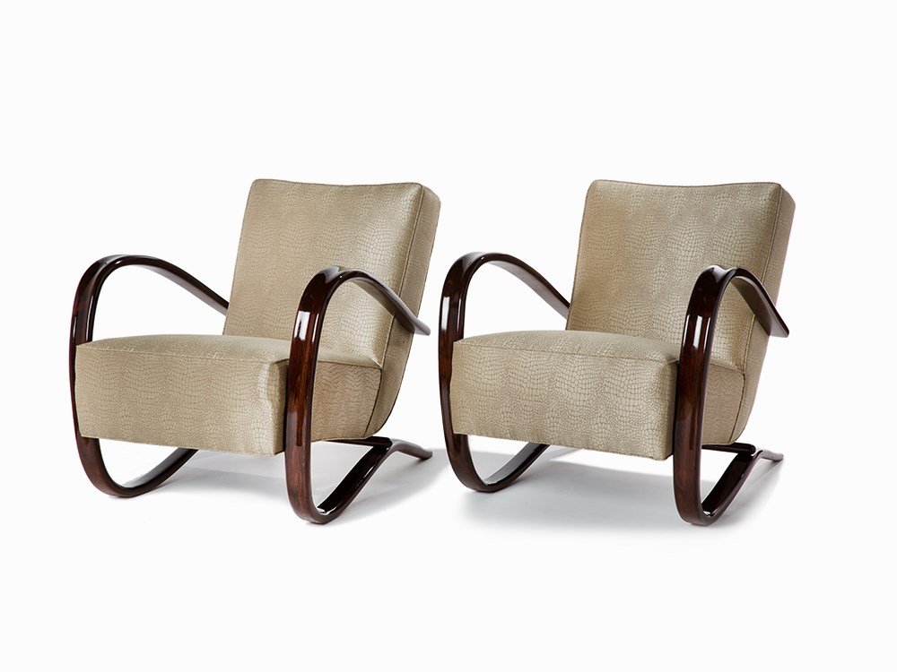 J. Halabala, Pair of Armchairs, Czechoslovakia, C. 1940: Walnut-stained beech and upholstered seat and backrest Czechoslovakia, circa 1940 Jindrich Halabala (1903-1978) Manufactured by Spojene UP Savody Model: Kreslo H269 Professionally restored and reuphol