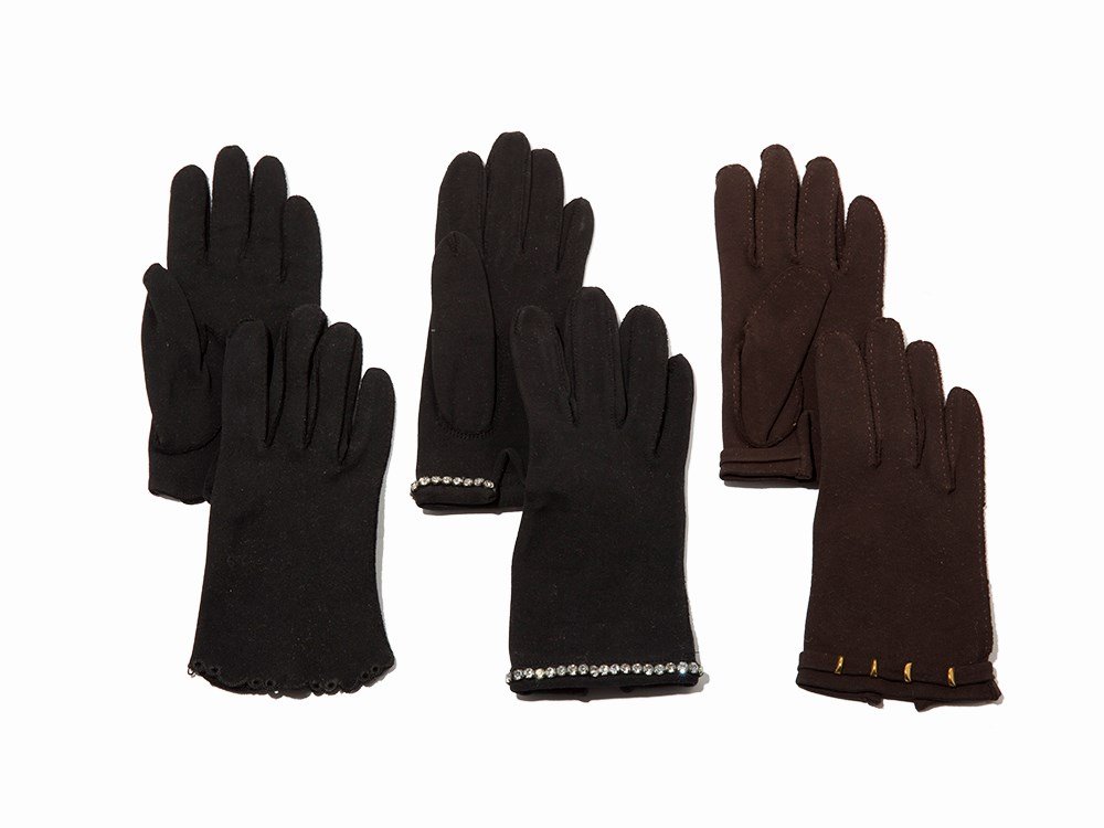 Elsa Schiaparelli. Three Pairs of Ladies’ Gloves,: Cotton, gold toned metal, rhinestones Italy, mid-20th century Elsa Schiaparelli, Italy Eyelet edged pair has printed ‘Schiaparelli by Fownes/7’ to interior Adorned pairs have printed ‘Schiaparel