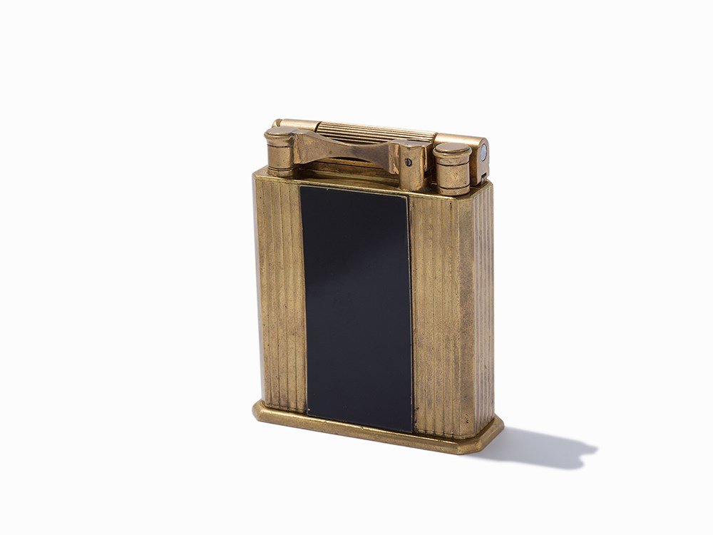 Dupont ‘Jeroboam’ for Hermès, Paris, c. 1930: Brass and enamel Paris, France, circa 1930 Table lighter Dupont for Hermès Hermès (1837-present) – French luxury goods company Marked on verso ‘ST DUPONT Paris Breveté tous pays’ / ‘HERMÈS