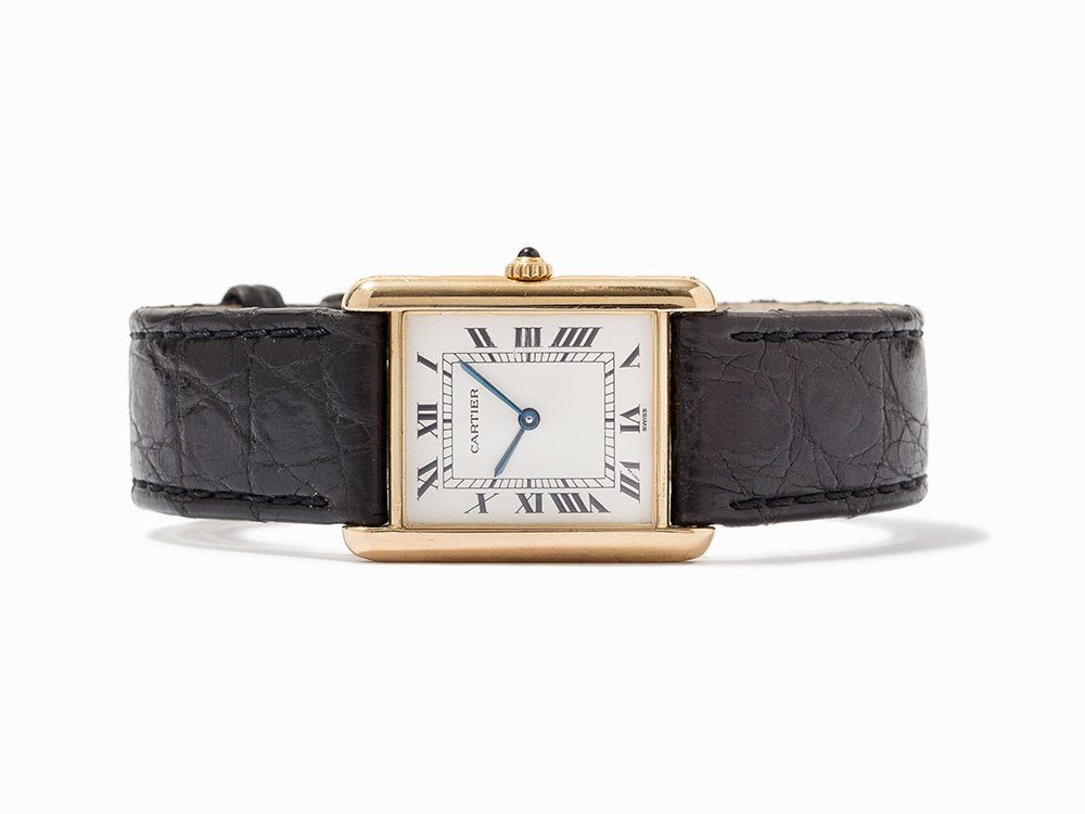 Cartier Tank Louis, Switzerland, c.1993: Cartier Tank Louis Switzerland, circa 1993 Quartz Movement; hours, minutes White dial with printed black Roman numeral hour-markers, minutes inner ring; Blued Baton hands 18kt Yellow Gold case, crown