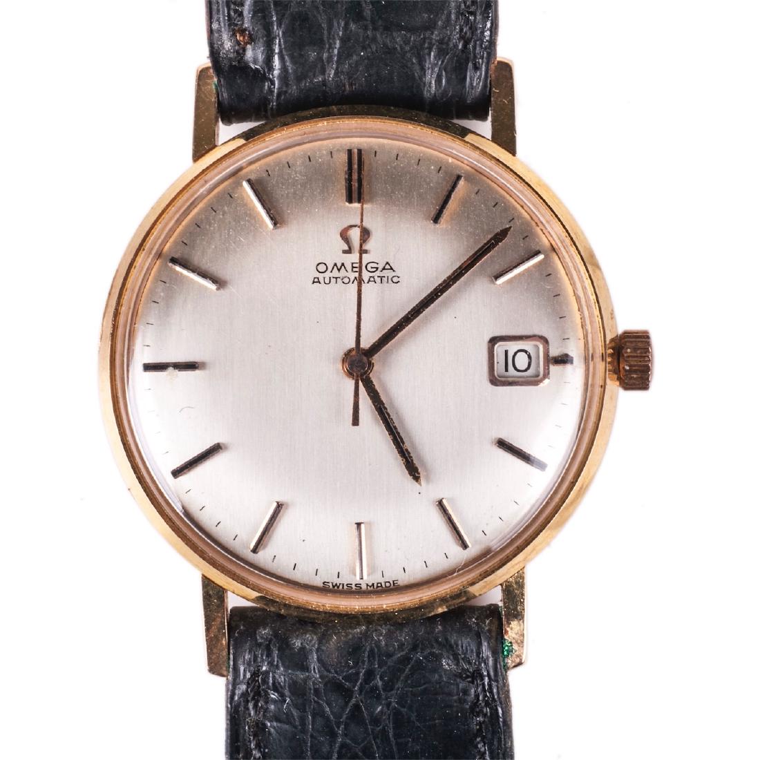 Omega 18K gold automatic wristwatch with calendar: "Omega" calendar automatic gold 18k-0.750 men's wrist watch. Silver color dial, applied indexes, baton hands. Case 18k-0.750. Hight grade movement, automatic, calendar, cal.565, 24 jewels. Case,dial, 
