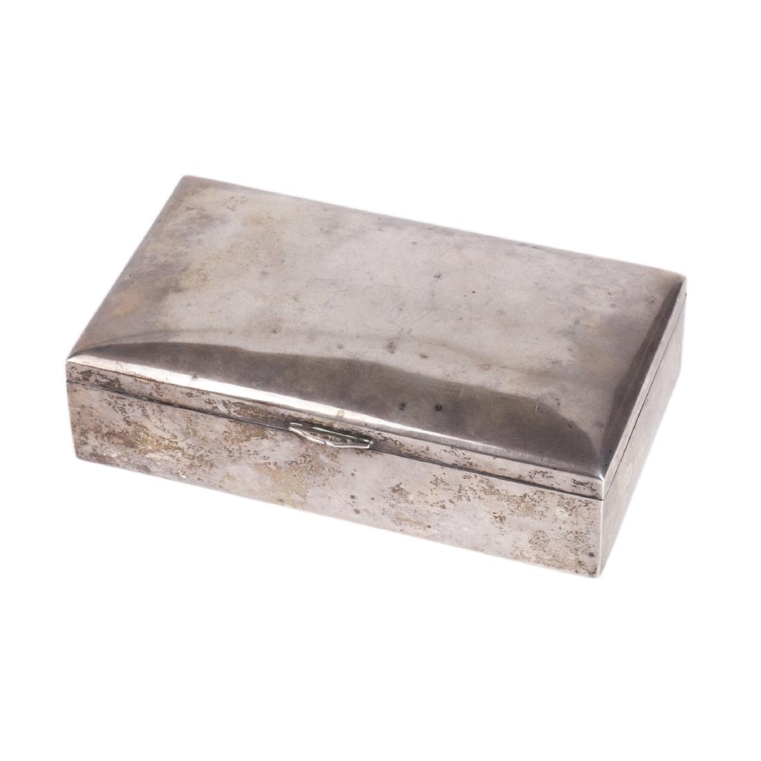 Antique silver cigar box with wooden inserts: Antique silver cigar box with wooden inserts. Made in Sweden in 1920. Silver, 830. Height: 5.3 cm. Dimensions: 20.5 x 12 cm. Total weight: 482 g.