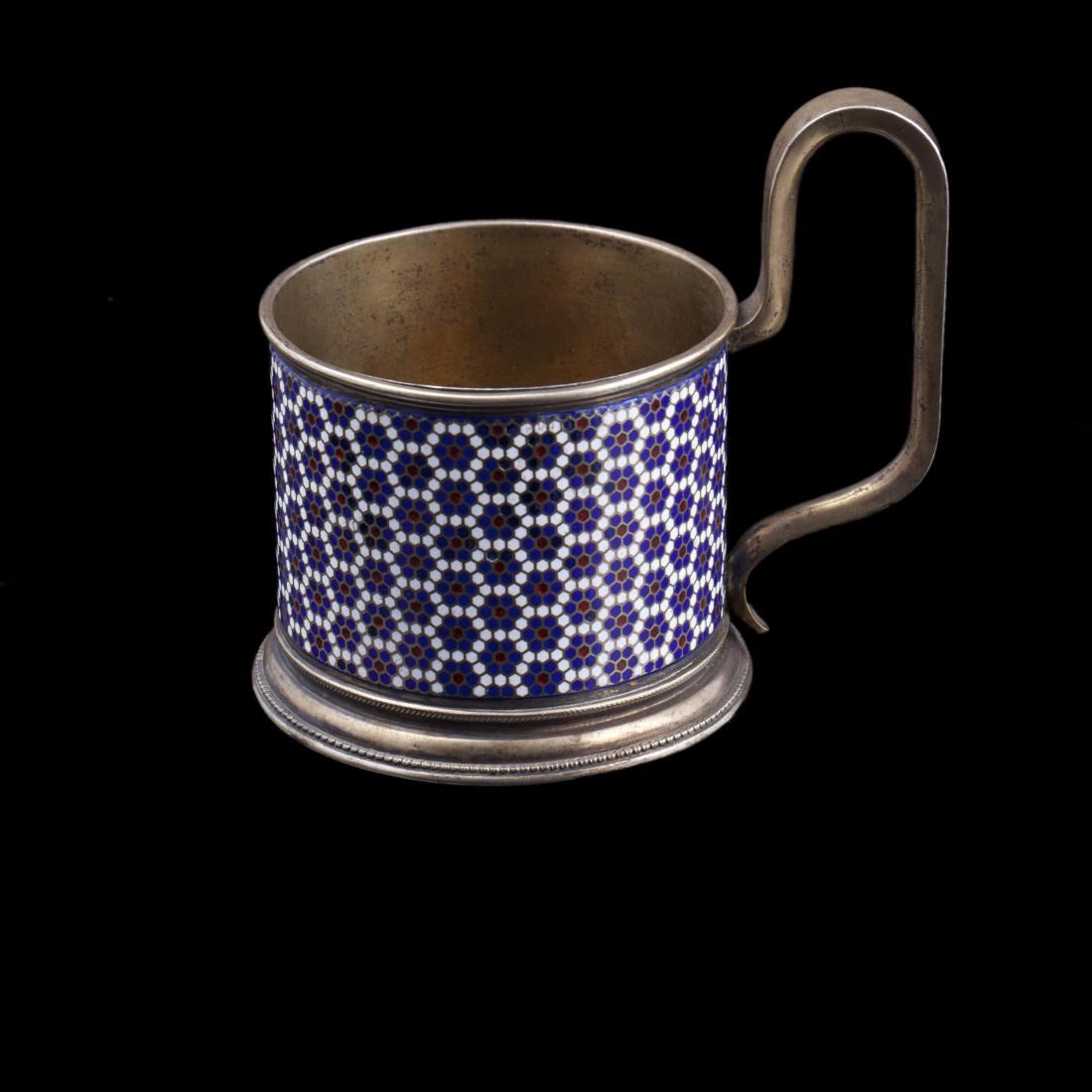 G.Klingert cloisonne enamel teaglass holder: Russian silver and cloisonne enamel teaglass holder. Makerâ€™s mark of Gustav Klingert. Moscow, 19 century. Weight: 152.4 g. Dimensions: 10 x 11 x 8 cm.