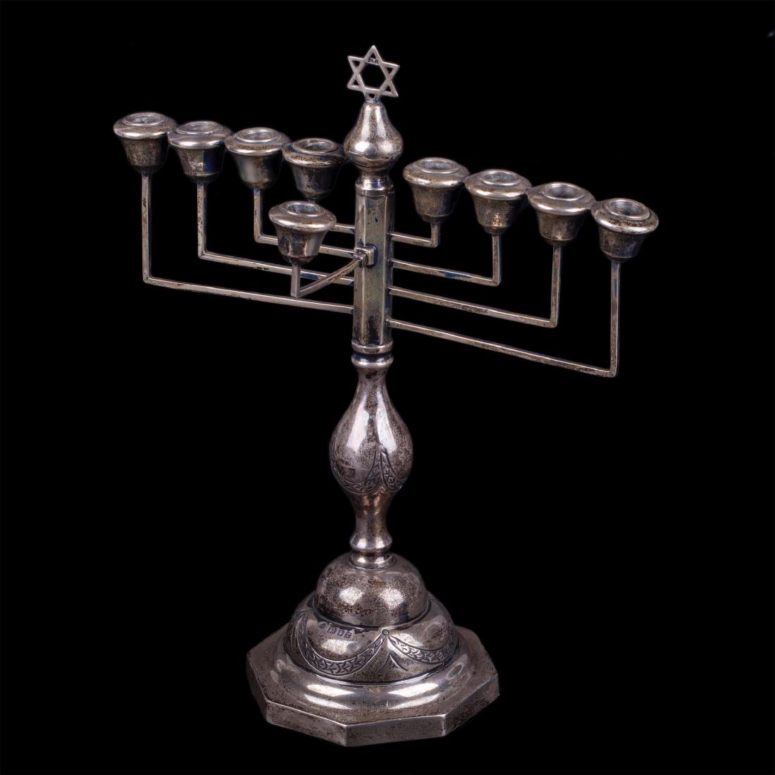 Silver Menorah. England, London, 1912-1913: Silver Menorah. England, London, 1912-1913. Weight: 477 gr. Dimensions: 29 cm. high.