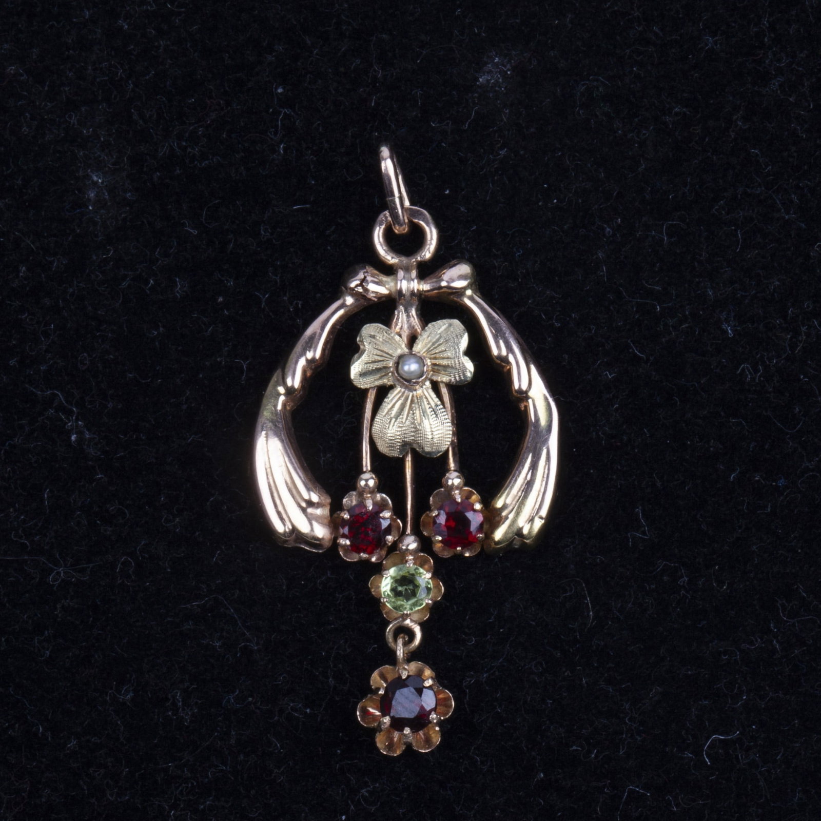 Karl Gahn. Gold Pendant with Official Archival Sketch: Karl Gahn. Gold Pendant with official archival sketch.Firm of Carl GahnSt. Petersburg, late 19th - early 20th centuryGold, rubies, emerald, pearl; engraved and polishedDimensions: 4.3 x 2.3 x 0.5 cm. 