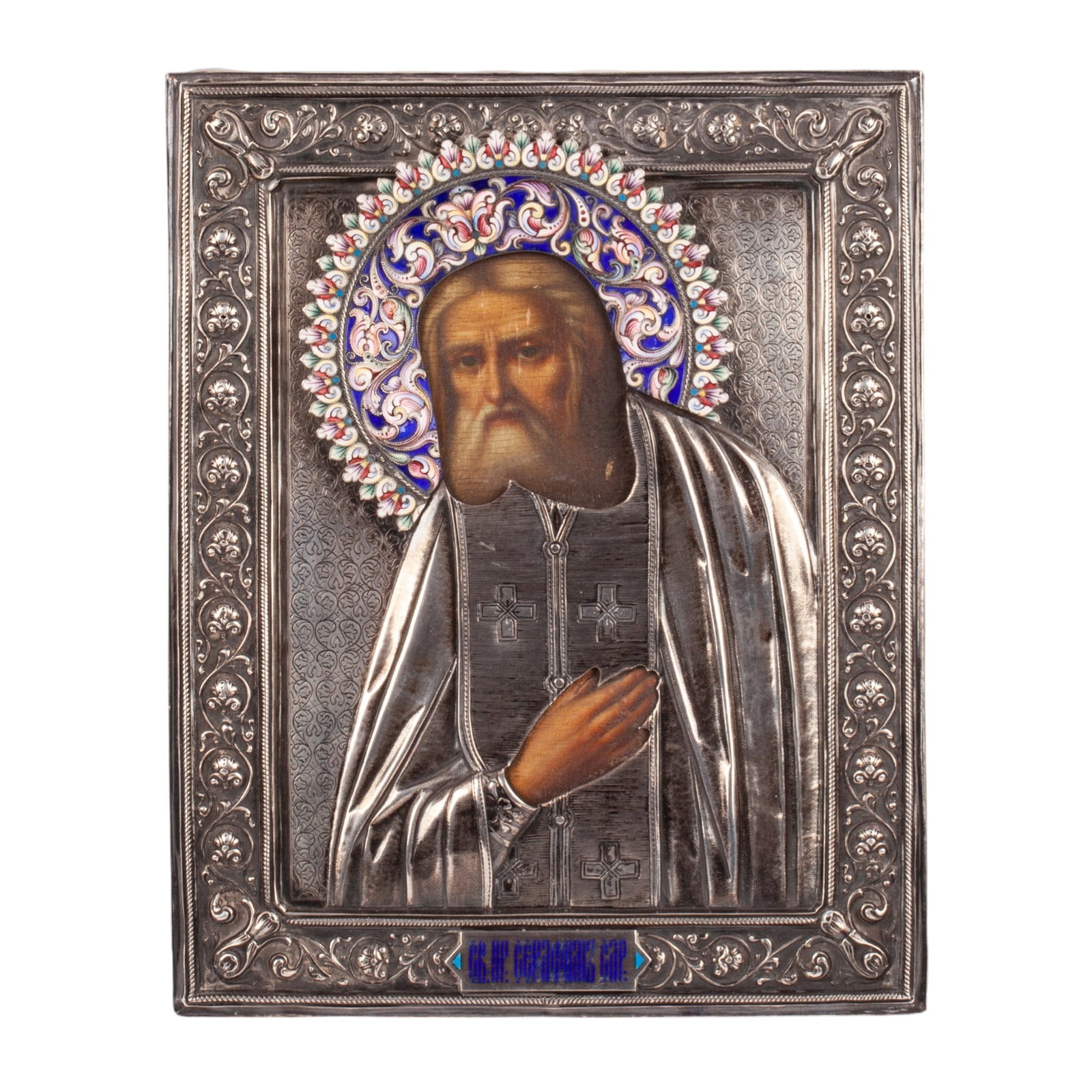 Russian Icon of Saint Seraphim of Sarov with Silver Oklad and Enamel, Ivan A. Alexeev, Moscow,: Russin Icon of Saint Seraphim of SarovMoscow, Ivan Alexeevich Alexeev, 1899-1908.Tempera on wood, silver oklad, enamel.Marked: maker's mark of IAA; 84 zolotnik silver standard, Moscow assay mark. Dime