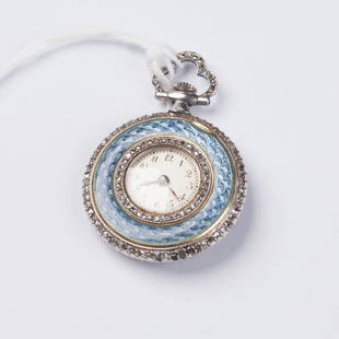 18K pocket gold watch.: 18K pocket gold watch. Diamonds, guilloche enamel. 2,3 cm. in diameter. 21 gr.