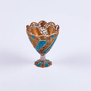 18K gold stand for egg with enamel.: 18K gold stand for egg with enamel. Weight: 27 gr. Height: 57 mm.