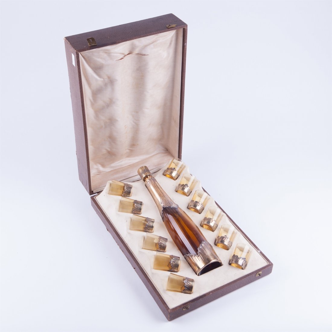 French bottle with 12 shot glasses in box with silver.: French bottle with 12 shot glasses in box with silver. Glass, Silver 950 proof, box. Dimensions: Bottle height: 31 cm. Shot glass 5 cm. height.