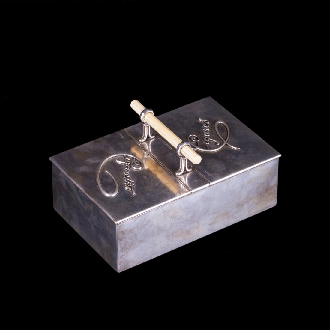 Silver and white material double lid cigar box by: Unusual silver and white material double lid cigar box by Faberge. Moscow, last quarter of the 19th century. Dimensions: 10 x 20 x 13 cm. Weight: 990 g.