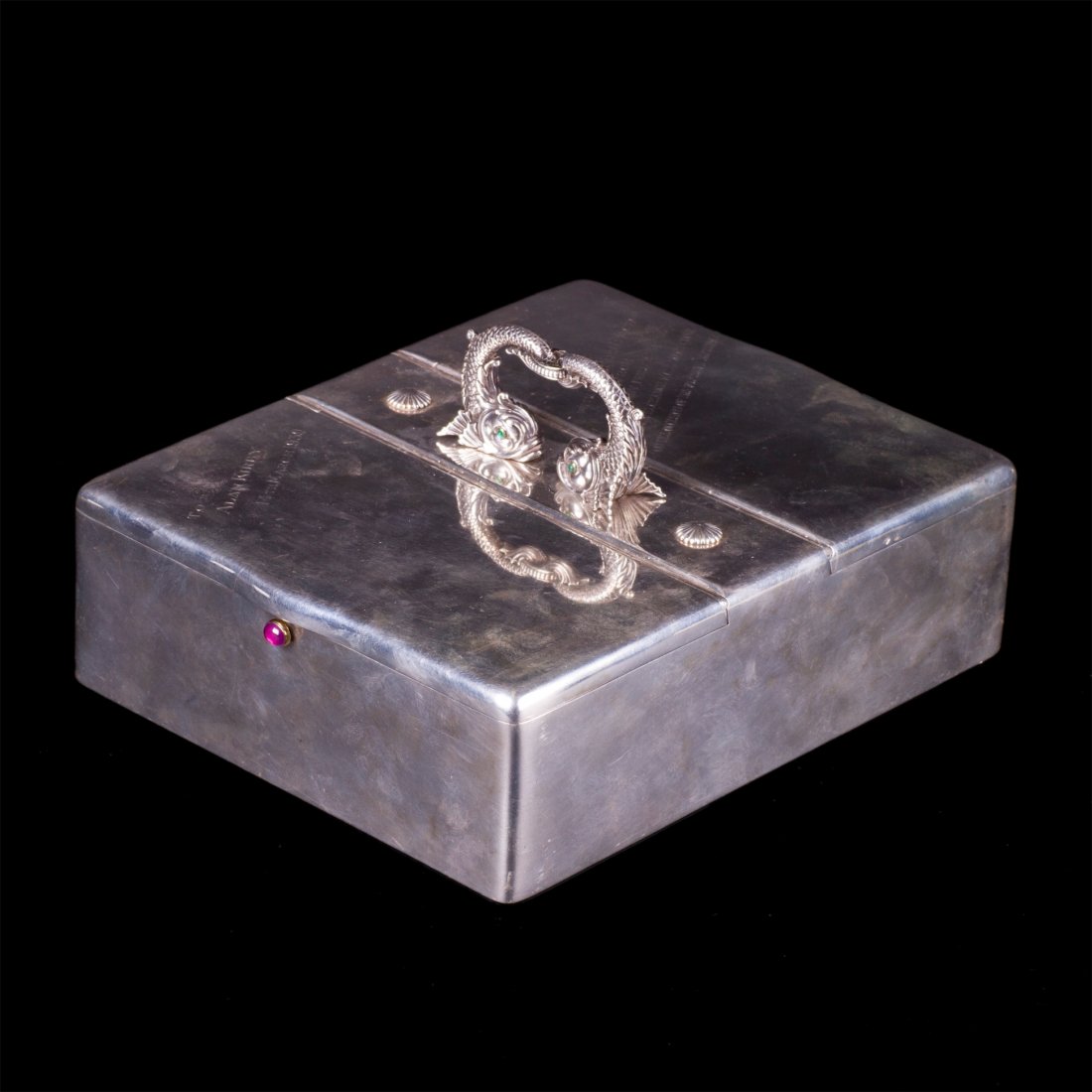 Grand W.A. Bolin neoclassical style silver cigar box: Grand W.A. Bolin neoclassical style silver cigar box - humidor with double lid and cast silver handle in the shape of dolphins. Moscow, 1908-1916. Dimensions: 11 x 23 x 18.5 cm. Total weight: 2585 g.