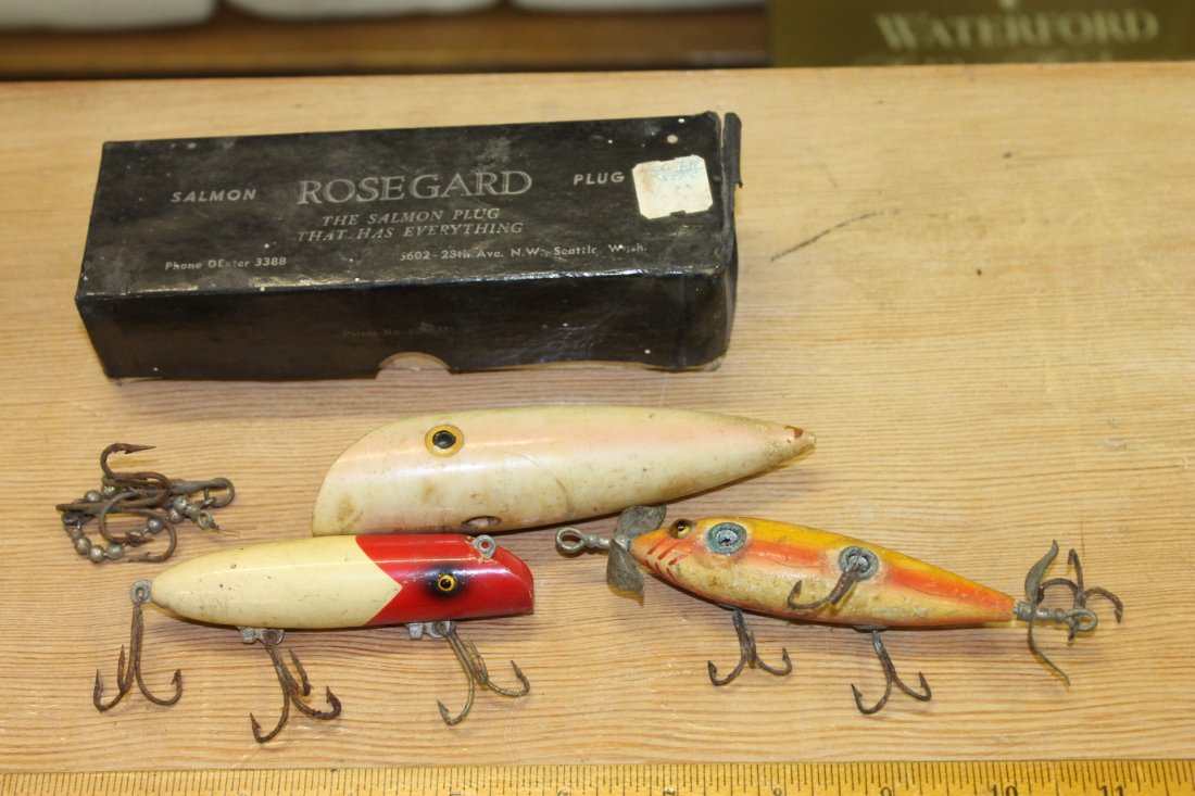 3 Vintage Fishing Lures / Plugs: Salmon Roseguard Salmon Plug box with a salmon plug. See photos for more information. Also included is a Heddon Dowagiac Minnow (missing a hook).