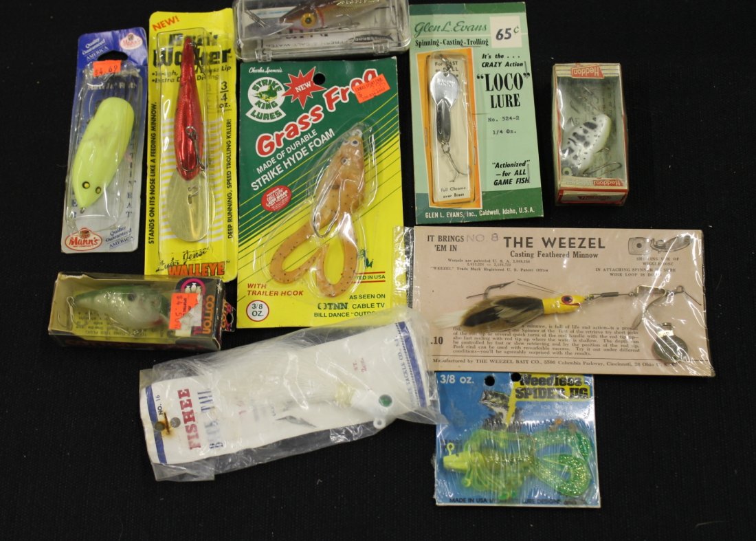 10 Assorted Lures in Original Packages & Boxes: Included: Weezel Casting Minnow, Guderod Bump and Grind, Rock Walker, Evans' Loco Lure, Grass Frog, Cordell Big-O, Heddon "Sonic". Fishee Buck Tail, Weedless Spidger Jig and Mann's Super Rattling Rat.