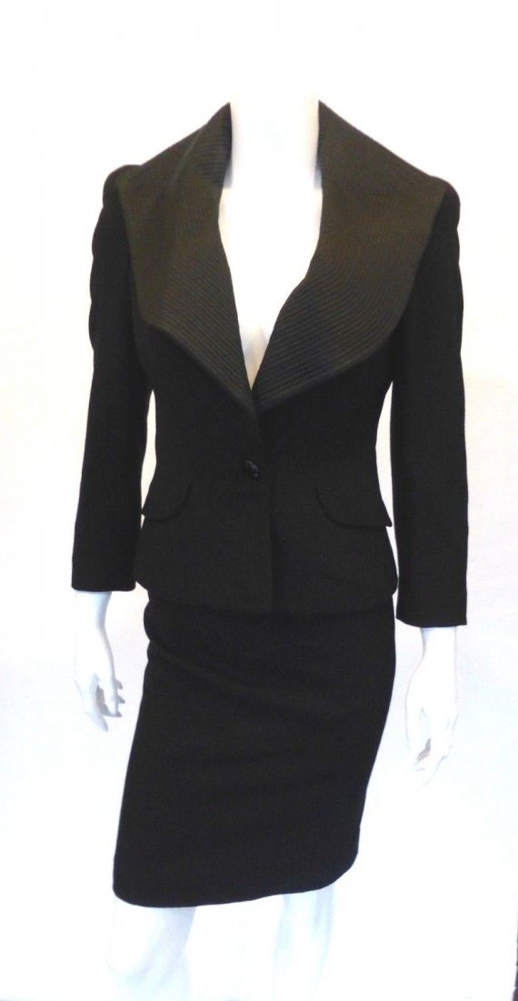 Alexander McQueen Black Skirt Suit, Size 2/38: Skirt suit made in Italy. Blazer with exaggerated collar and skirt.