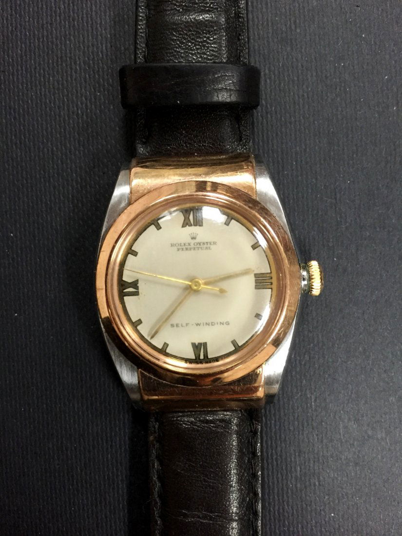Antique Rolex Oyster Perpetual Men's Watch: Antique Rolex Oyster Perpetual self - winding two tone Men's Watch 1940's R.W.C. Automatic movements -- The first self-winding Rolex wristwatch was offered to the public in 1931 (so-called the "bubble
