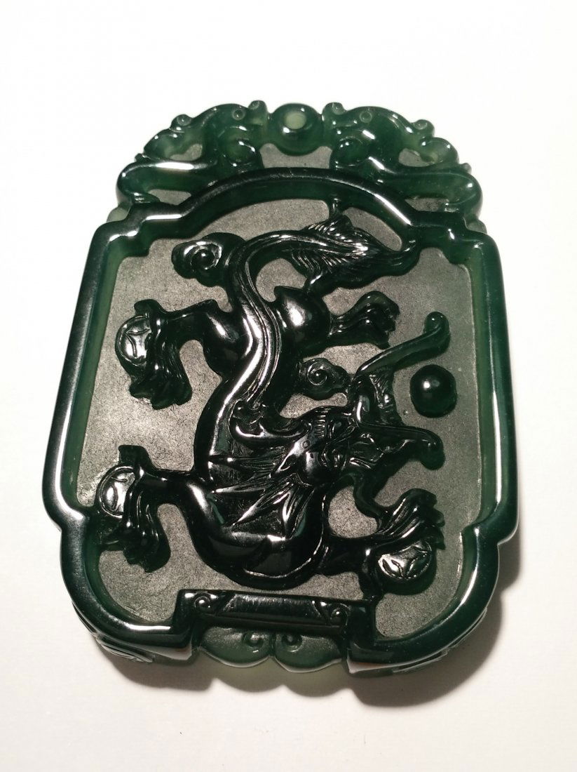 A Fine Natural Icy Old Green Jadeite Dragon Pendant (1 of 2)
