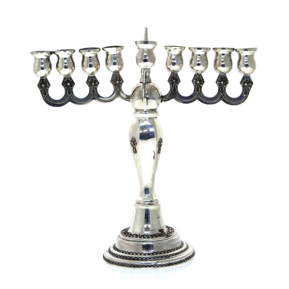 Sterling Silver Hanukkah Lamp Menorah.: Sterling Silver Hanukkah Lamp Menorah, Judaica. With filigree ornaments. Marked. Height: 25cm. 278gr. Minor dents.