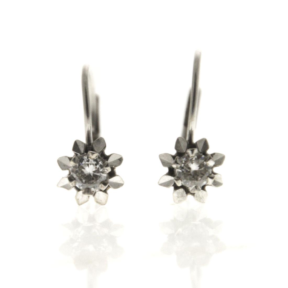Pair of 14k White Gold Diamond Earrings. (1 of 3)