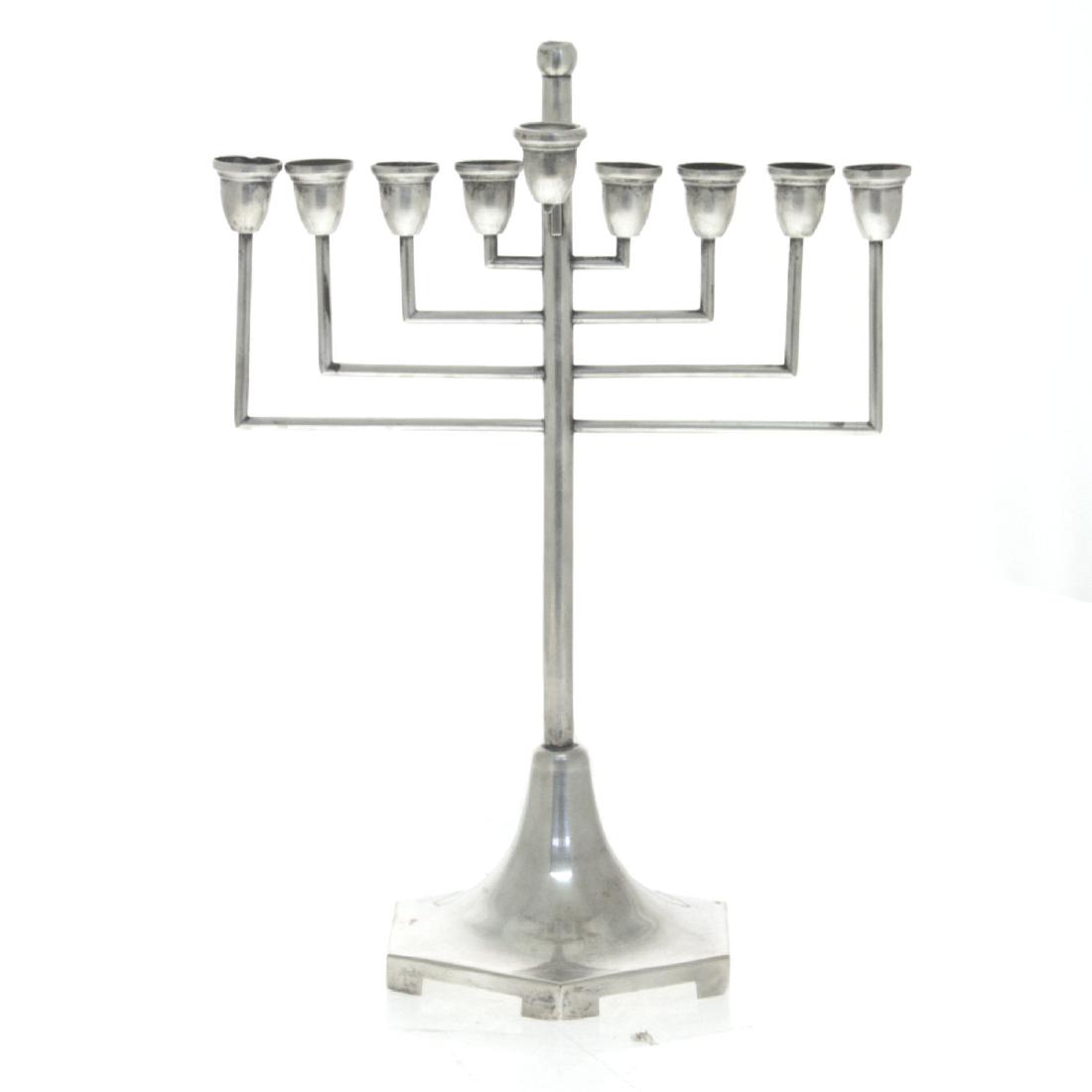 Silver Hanukkah Lamp Menorah, Krakow, Poland, 1920s,: Silver Hanukkah Lamp Menorah, Krakow, Poland, 1920s, Judaica. Detachable servant light (Shamosh). Marked. Height: 34cm. 329gr. Minor dent to the top of the center stem.