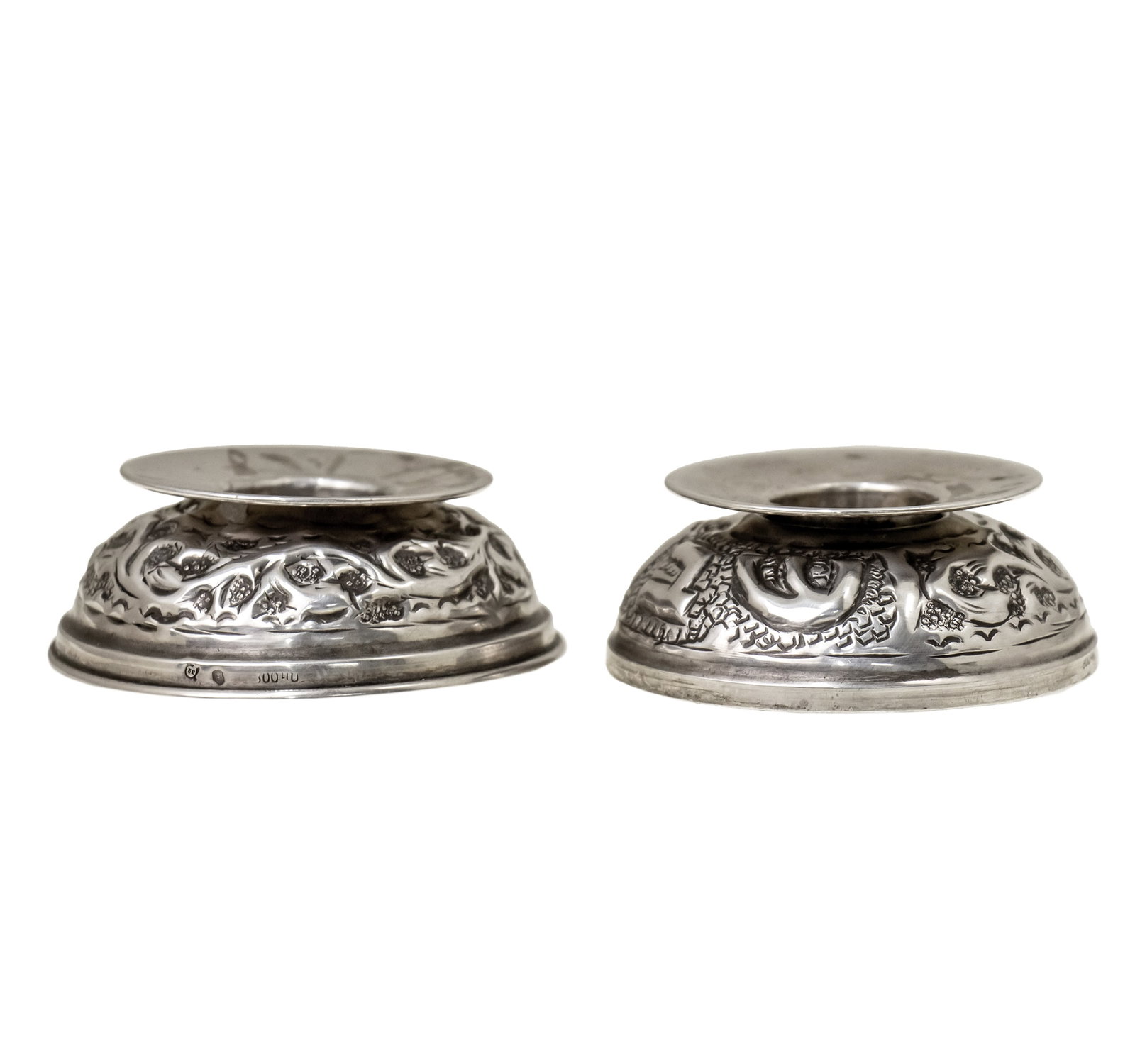 Pair of Silver Travelling Candlesticks.: Pair of Silver Travelling Candlesticks. Consists of four parts that close into a ball shape. Marked. Diameter: 6cm. 45gr.