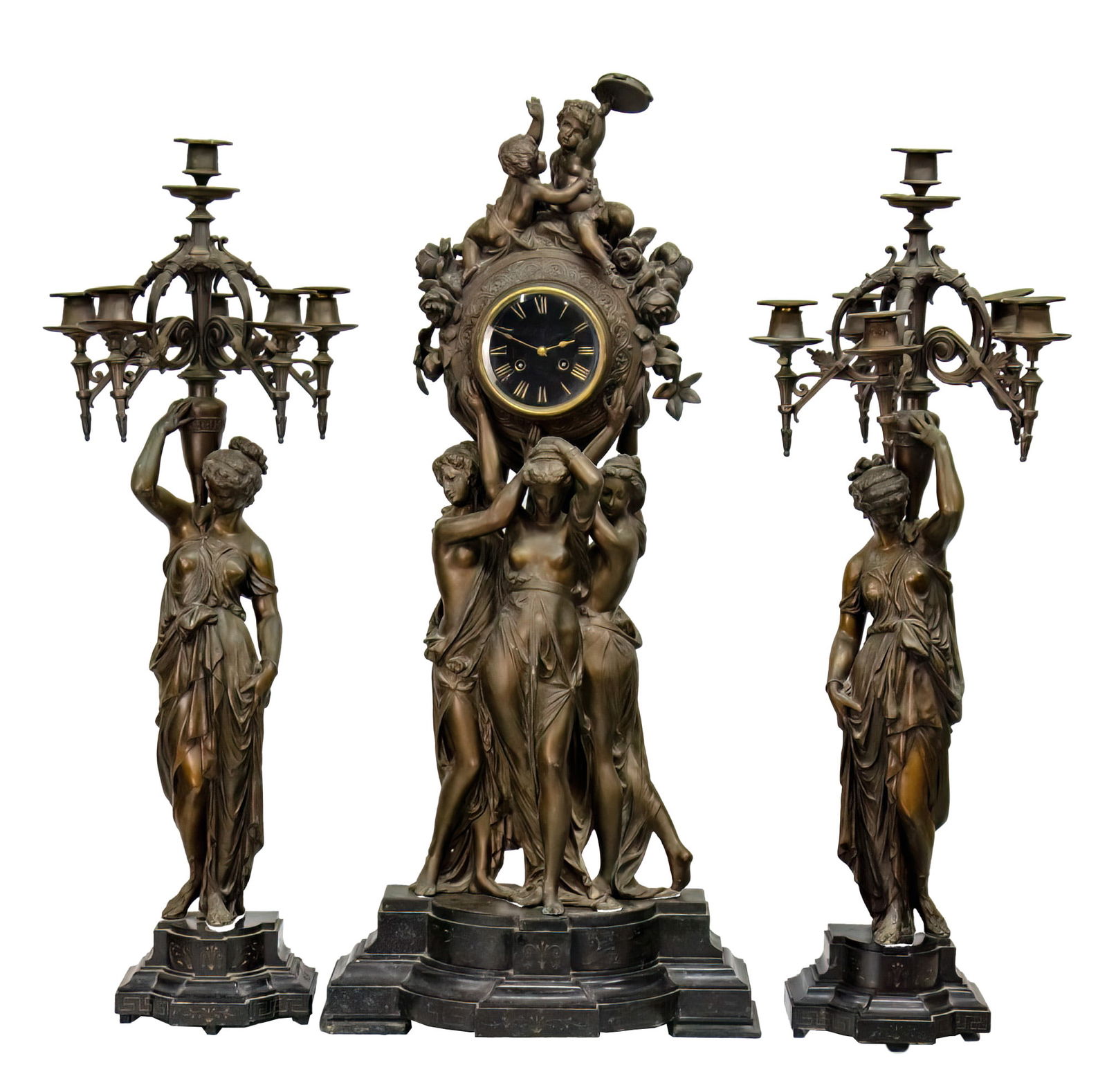 Large and Impressive Sculptured Fireplace Clock with Two Garnitures.: Large and Impressive Sculptured Fireplace Clock with Two Garnitures. Sculptured in spelter with three women holding the clock and two cherubs on top of it. Two spelter candelabras carried on a woman's