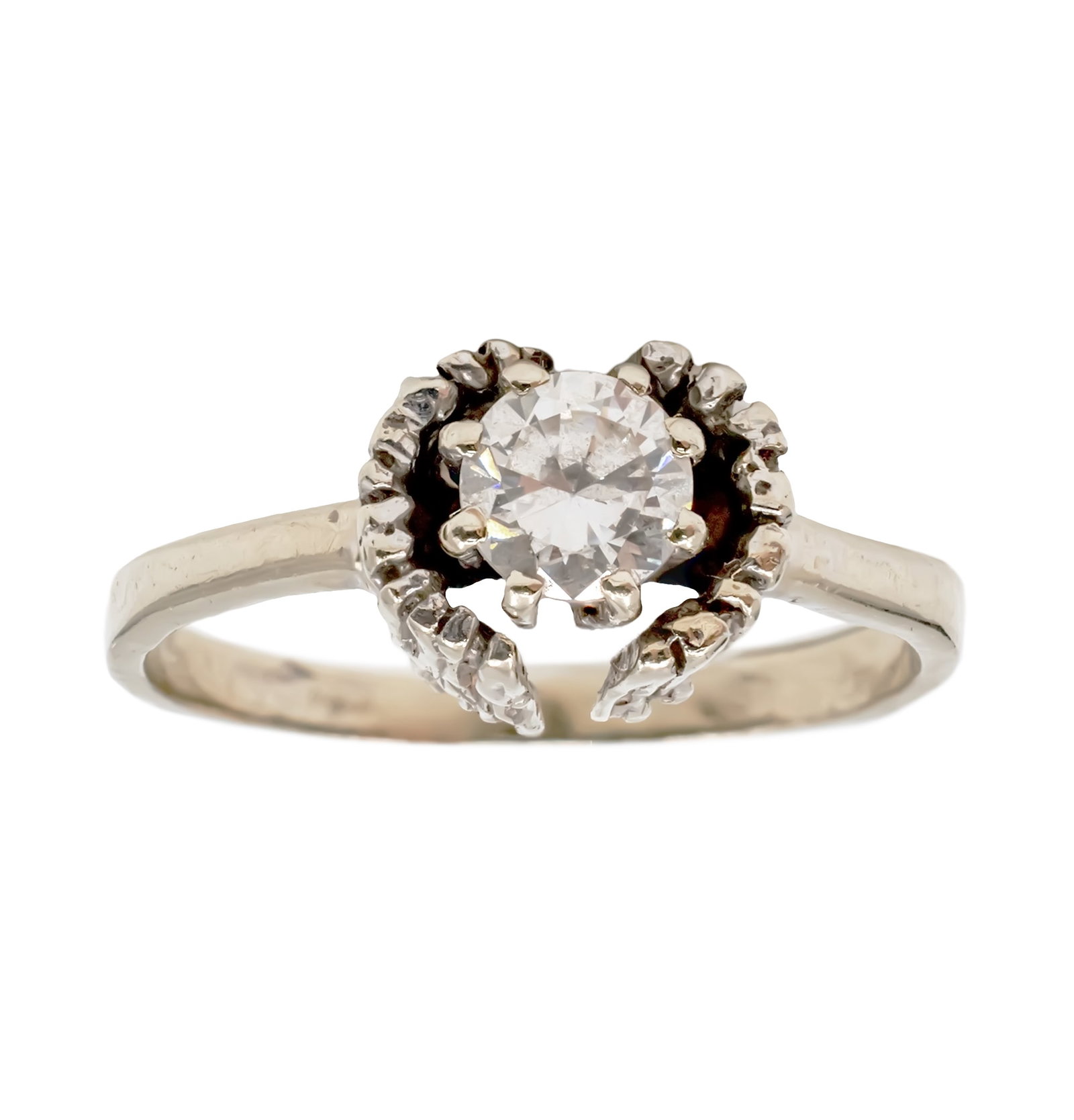 14k White Gold Ring.: 14k White Gold Ring. Set with a CZ. Marked. Size: 7. 3.63gr.