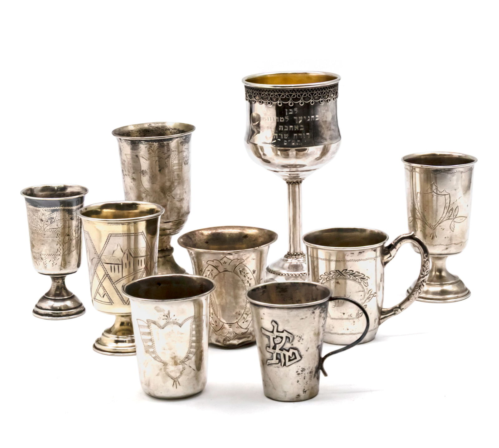 Lot of 9 Silver Cups.: Lot of 9 Silver Cups. Marked (Each). Height: 6-14.5cm. 396gr.