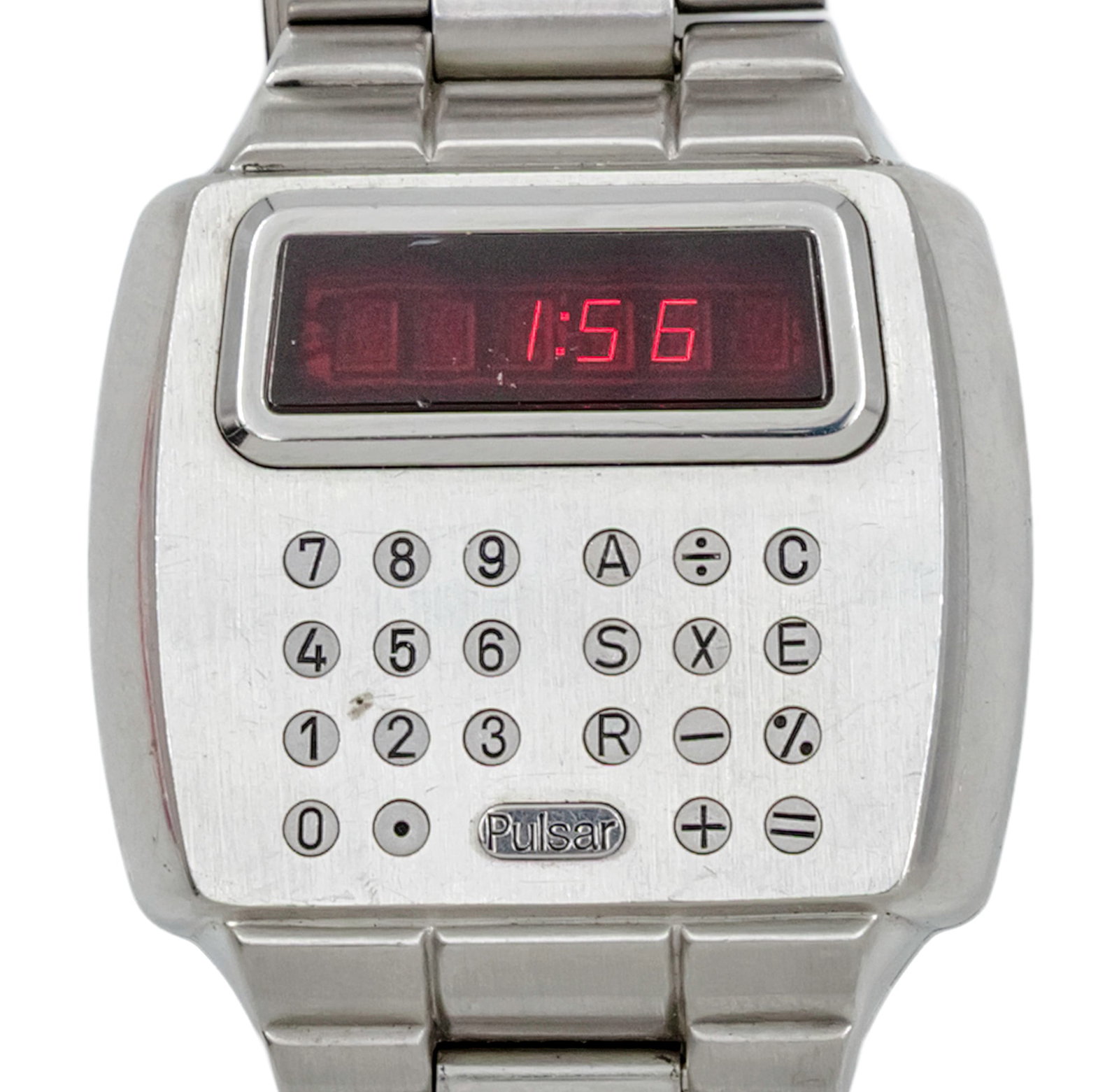 Pulsar Calculator Wristwatch.: Pulsar Calculator Wrist Watch. 1970s. Quartz movement, working condition. original stainless steel bracelet and deployment clasp. Comes with the original pen. 41.5x40.5mm.