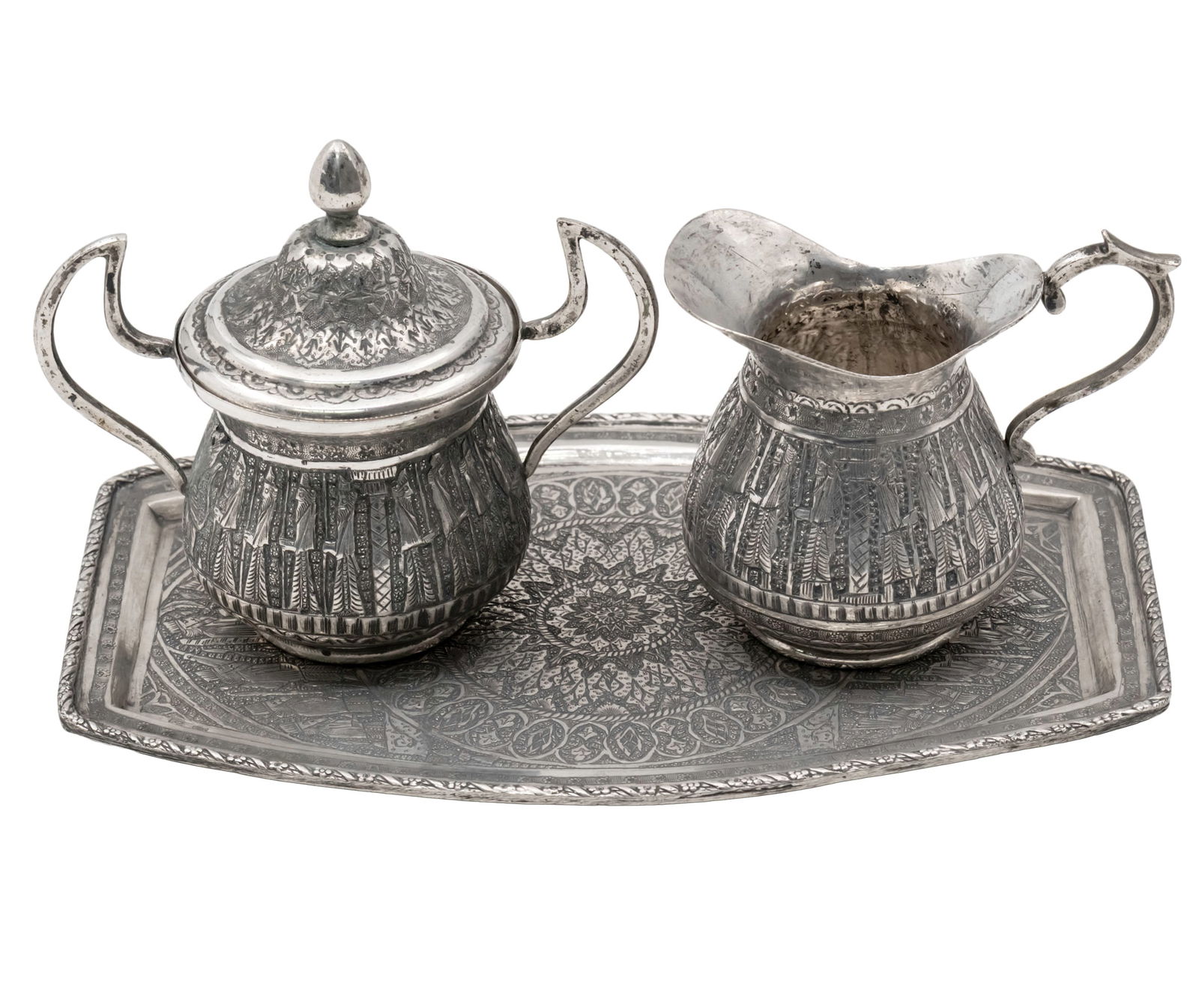 Persian Silver Sugar Bowl and Milk Jug on Tray, Early 20th Century.: Persian Silver Sugar Bowl and Milk Jug on Tray, Early 20th Century. Marked (each piece). Tray: 19x12.5cm. Milk jug height: 7.5cm. Sugar bowl height: 9.5cm. 414gr. 
