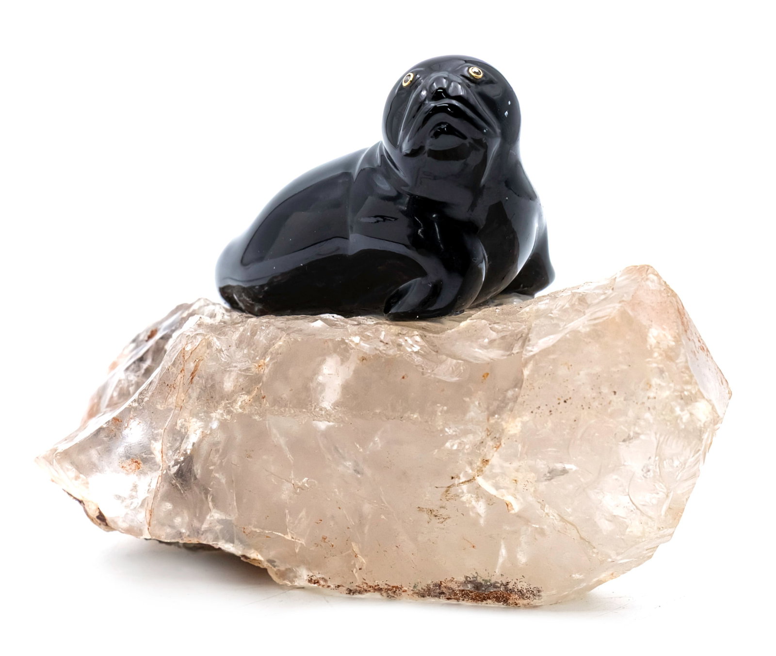 Hand Carved Black Obsidian Seal Figure with Gold, Diamonds and Rock Crystal.: Hand Carved Black Obsidian Seal Figure with Gold, Diamonds and Rock Crystal. Beautifully carved black obsidian with diamond set eyes in gold settings. Rock crystal base. Height: 10cm. Length: 16cm.