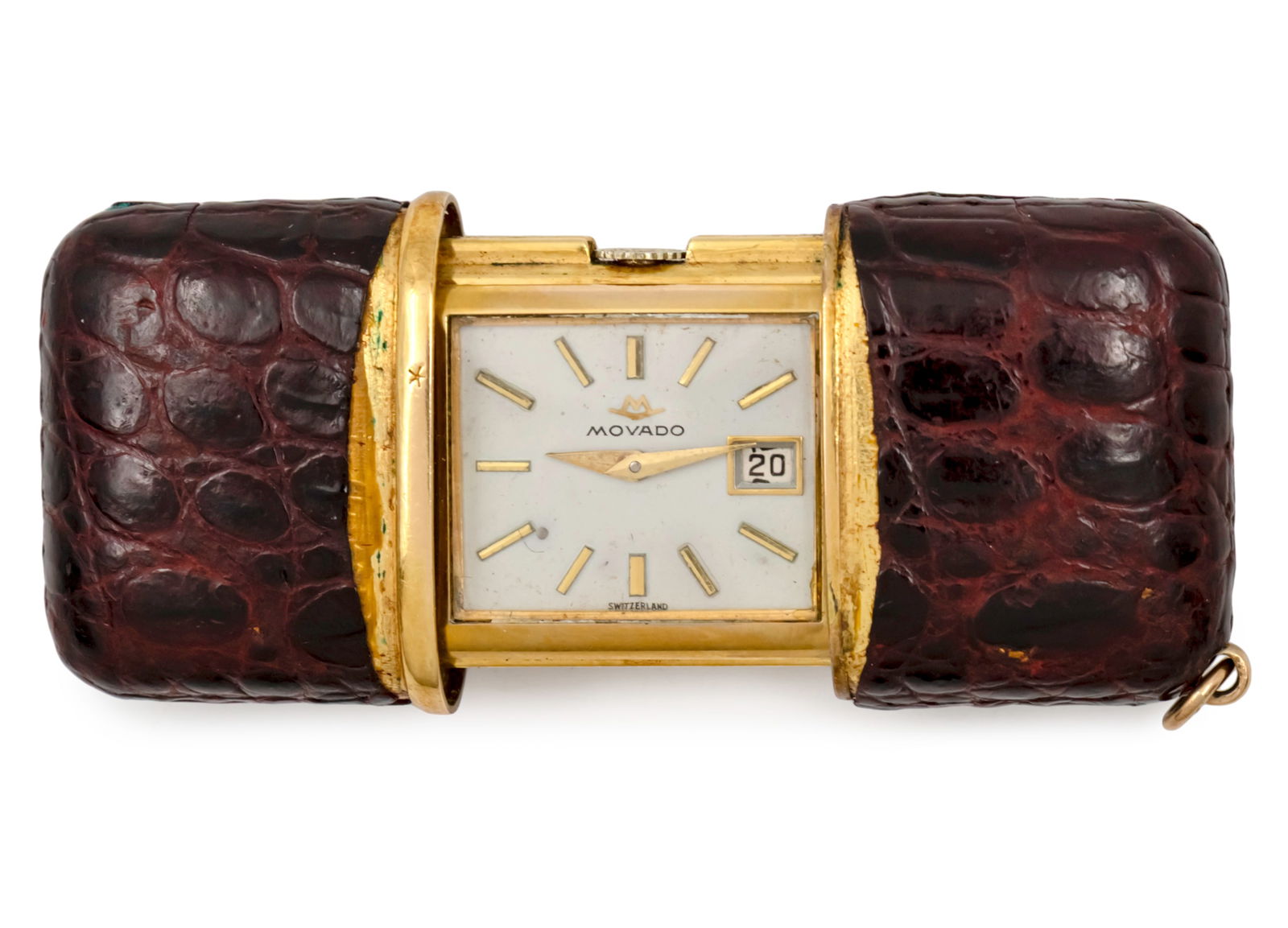 Movado Travel Clock.: Movado Travel Clock. Beautiful leather case, slide action, folding easel back. Mechanical movement. Working condition. Date. 4.2x2.7cm (closed).