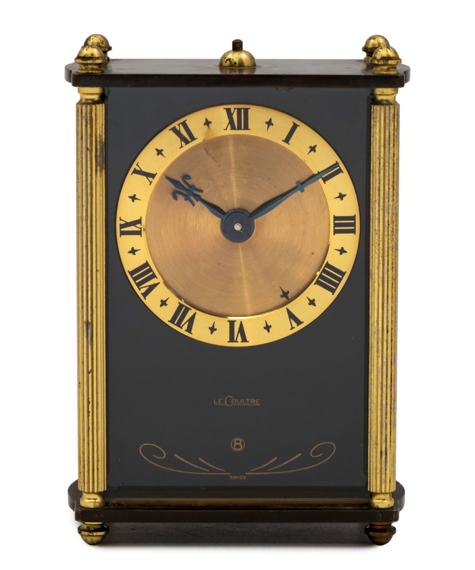 Musical Alarm Desk Clock by Le Coultre.: Musical Alarm Desk Clock By Le Coultre (Later Known As Jaeger Le Coultre). Mechanical 8-day movement, working condition. Alarm and musical box in working condition. Height: 9.5cm. 