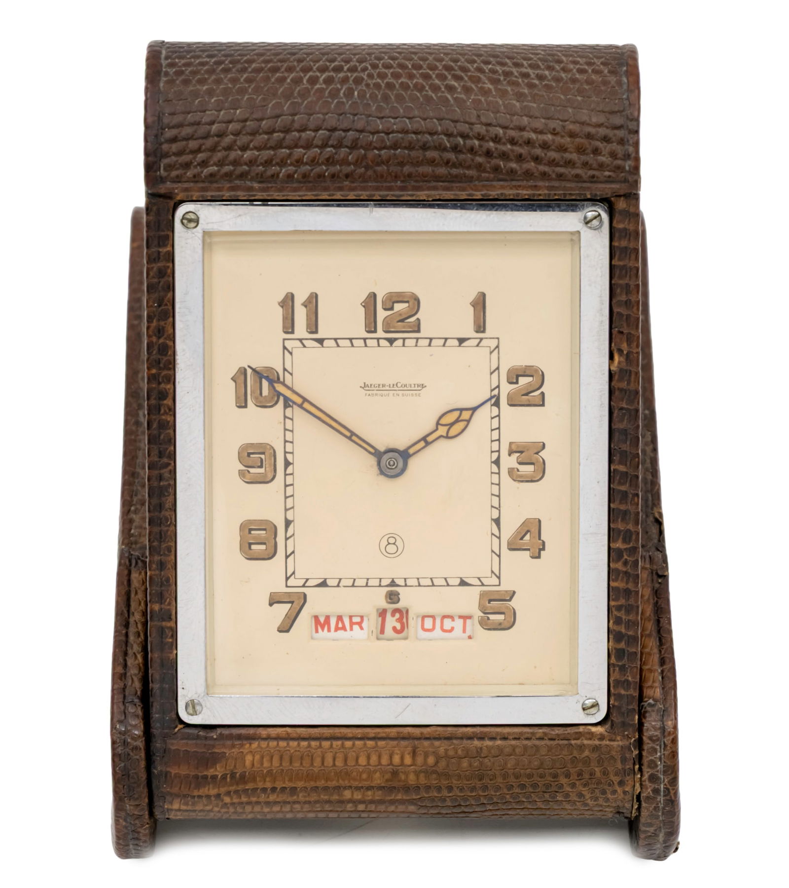 Jaeger Le Coultre Triple Date Travel Clock.: Jaeger Le Coultre Triple Date Travel Clock. 8 day mechanical movement, working condition. Including - day, date and month. Folding leather covered case. 11.5x7.5x3cm.