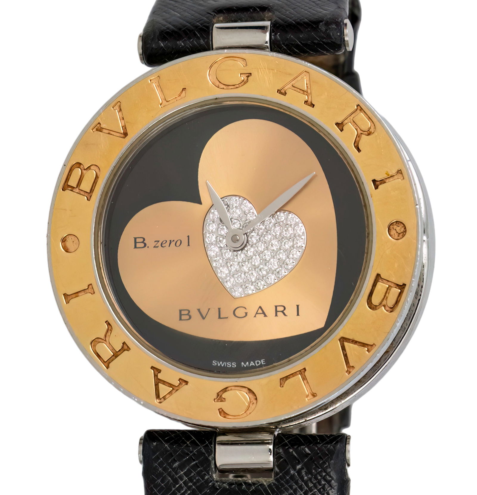 Bulgari B.zero1 Ladies Wristwatch.: Bulgari B.zero1 Ladies Wrist Watch. Stainless steel case with 18k gold bezel. Quartz movement, working condition. Diamond set dial. Original leather strap. Original buckle. 