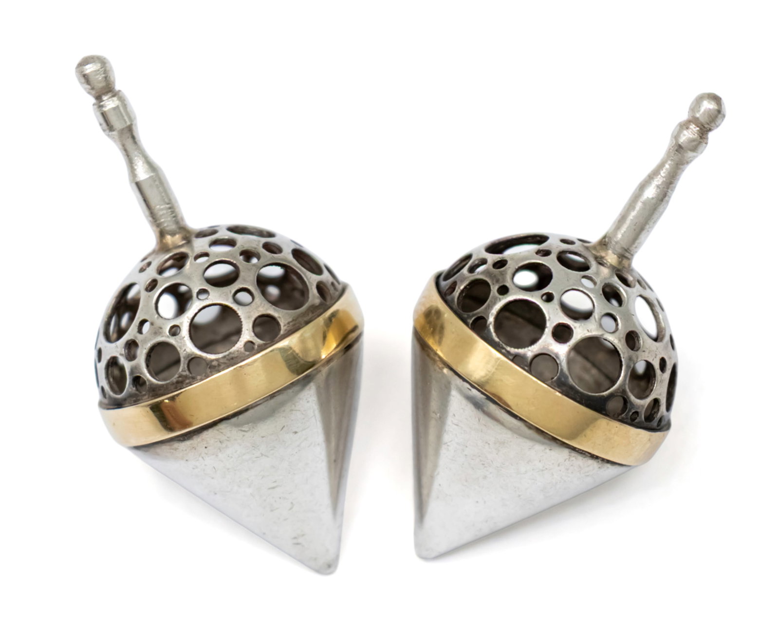 Pair of Silver and Gold Hanukkah Dreidels.: Pair of Silver and Gold Hanukkah Dreidels, Judaica. Not marked, acid tested (for both silver and gold). Length: 4cm. 13gr.