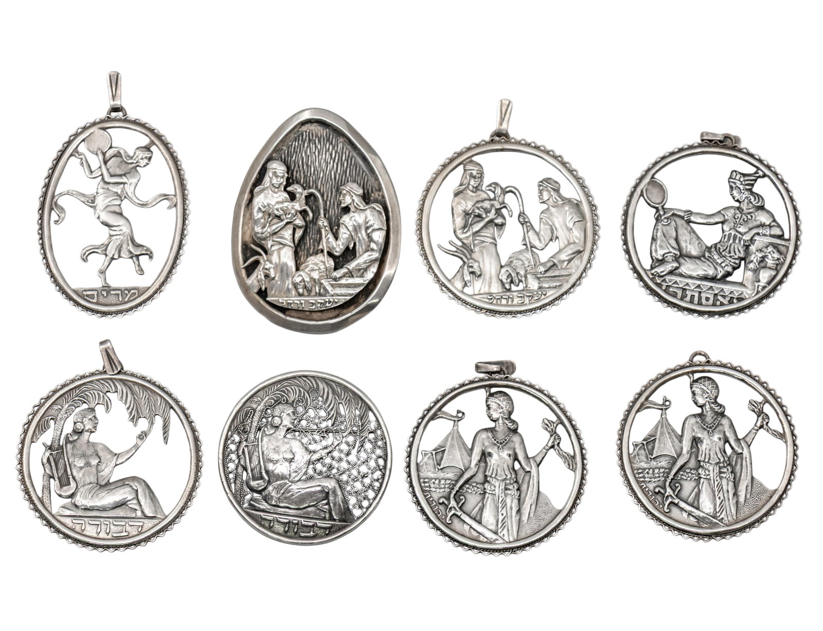 Collection of Eight Bezalel Sterling Silver Brooches and pendants, Jerusalem, 1950s-60s.: Collection of Eight Bezalel Sterling Silver Brooches and pendants, Jerusalem, 1950s-60s. Designed by Zeev Raban. Marked (each). 62gr.