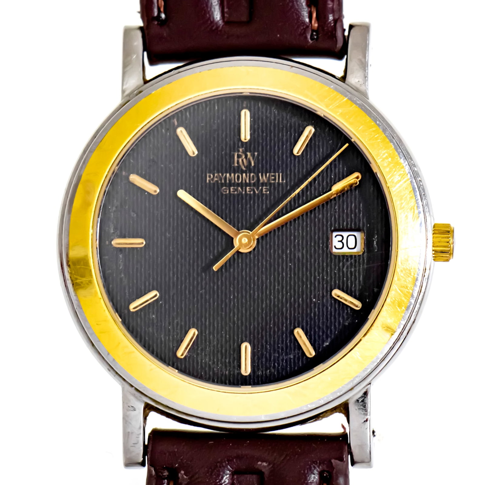 Raymond Weil Wristwatch.: Raymond Weil Wrist Watch. Quartz movement, working condition. date. Leather strap. 34mm. Ref: 9157.