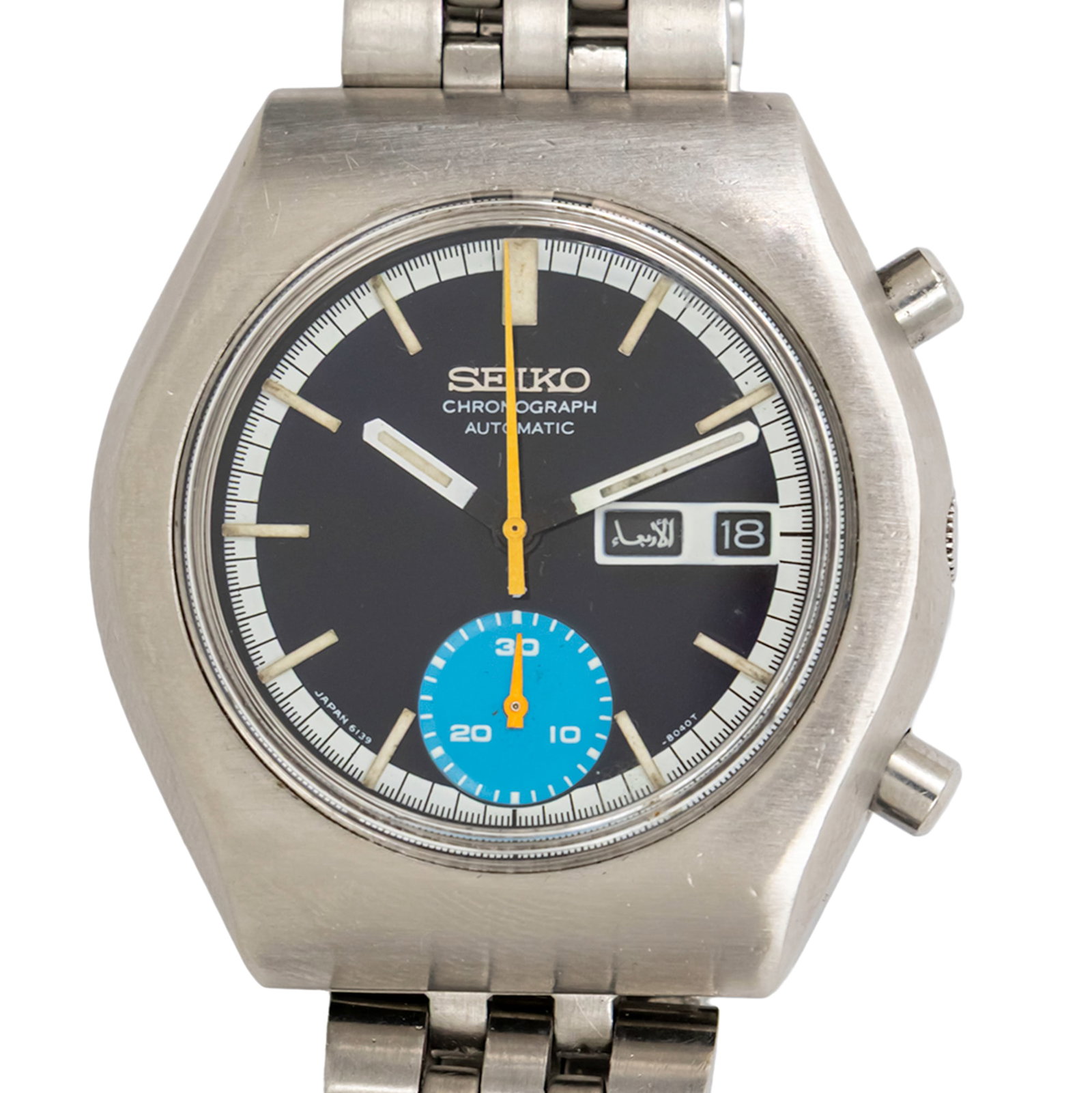 Seiko Blue Eye Chronograph Wristwatch, 1970s.: Seiko Blue Eye Chronograph Wristwatch, 1970s. Automatic movement, working condition. Day (English and Arabic) and date. Stainless steel bracelet with deployment clasp.. Ref: 6139-8020 42x40mm.