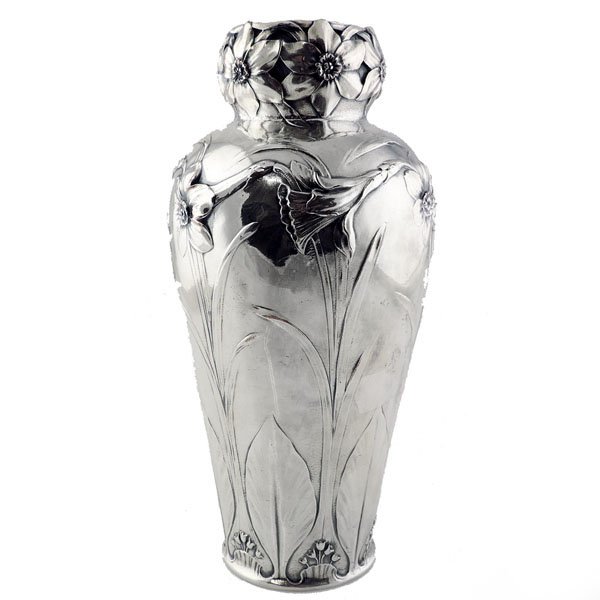 Art Nouveau Christofle Silver Plated Vase Paris Ca 1900: The narrow neck with heavily cast flower heads above body cast with daffodils, leaf tips, and lilies of the valley. Engraved monogrammed. Marked. Height - 22cm / 8.66in. 606gr / 19.48oz.