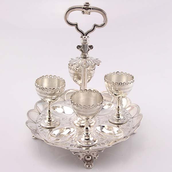 Victorian Silver Plated Egg Cruet Atkin Bros 1853-1868: Victorian Silver Plated Egg Cruet, Atkin Brothers, Sheffield, England, 1853-1868. 4 egg cups. the carrying handle with designated spoons holder (no spoons). Marked with English silver plate marks for