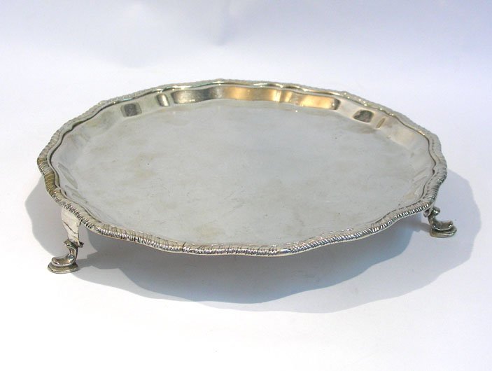 Sterling Silver Salver, Charles Boyton, London, 1899.: Victorian Sterling Silver Salver, Charles Boyton, London, England, 1899. With gadroon rim, set on three pad feet. Initialed at the center - GMR (partly removed). Fully hallmarked for London, England,